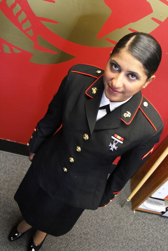 U.S. Marine Corps Pfc. Aseel Salman, currently one of the only Iraqi-born female Marines, poses for a photo at a Recruiting Station Frederick, Md., office. Salman graduated from Marine Corps Recruit Training Nov. 15, 2013.  She is scheduled to depart for Camp Geiger N.C. in two weeks for combat training followed by her military occupational school for aviation electronics. (U.S. Marine Corps photo by Sgt. Amber Williams/Released)