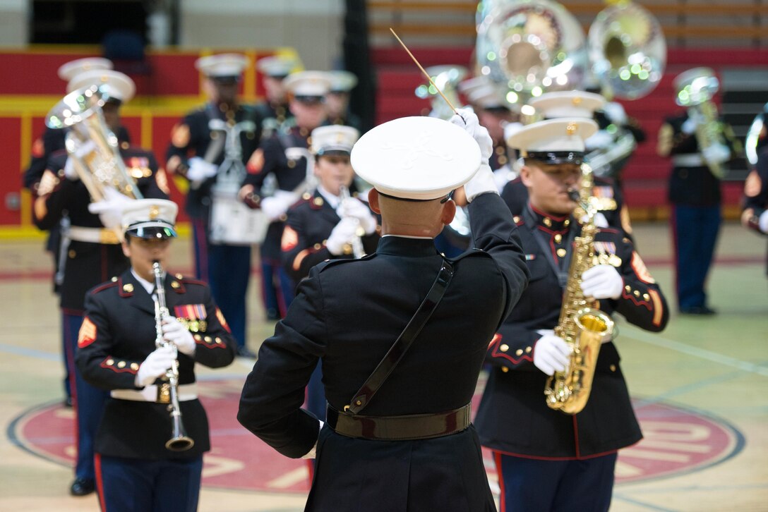 Chief Warrant Officer 4 Robert Szabo, the director and officer in charge of the East Coast Marine Corps Composite Band, conducts band members during rehearsal Nov. 26, at Marine Corps Base Quantico, Va.  The composite band will perform in the Macy’s Thanksgiving Day Parade, Nov. 28.  (U.S. Marine Corps photo by Cpl. Melissa Karnath/Released)
