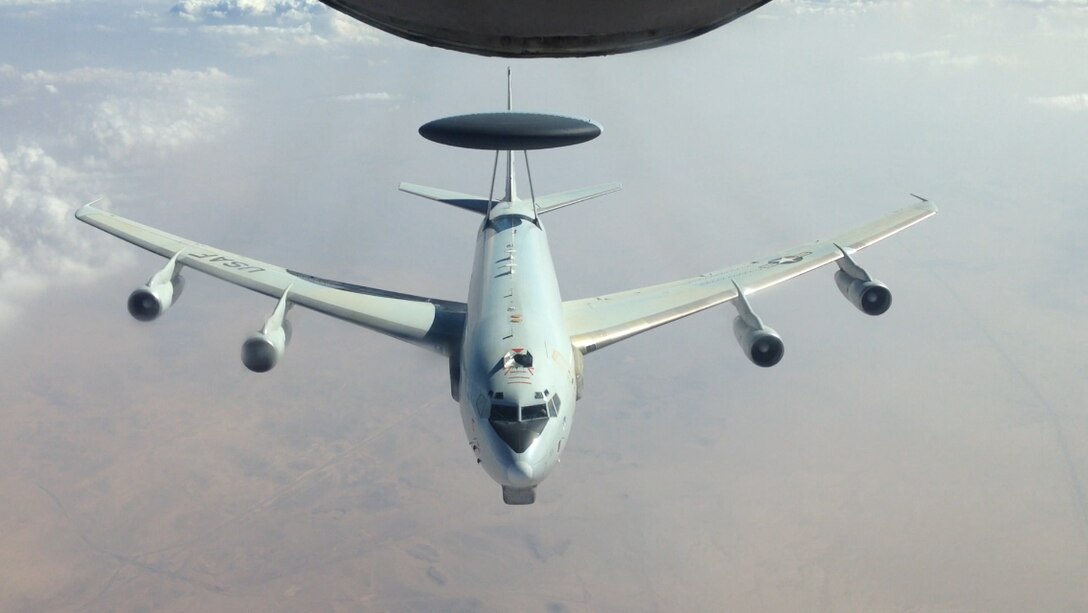 An E-3 Sentry airborne warning and control system flies over an undisclosed location in Southwest Asia just after refueling Nov. 16, 2013. AWACS provide service members situational awareness of friendly, neutral and hostile activity, command and control of an area of responsibility, battle management of theater forces, all-altitude and all-weather surveillance of the battle space, and early warning of enemy actions during joint, allied, and coalition operations. 