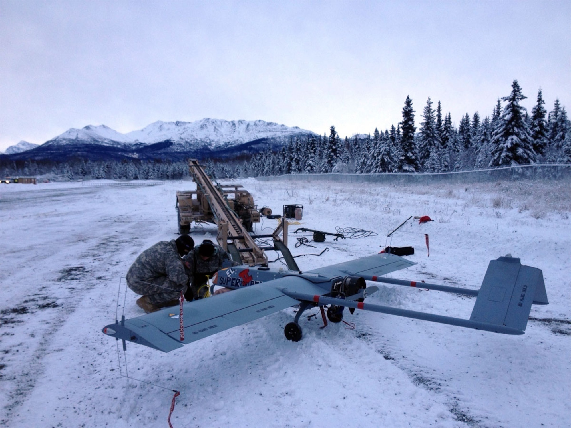 Paratroopers assigned to the 425th Brigade Special Troops Battalion, conduct a final inspection of an unmanned aircraft system before its launch from Forward Operating Base Sparta on Joint Base Elmendorf-Richardson Nov. 15.  (Courtesy photo)