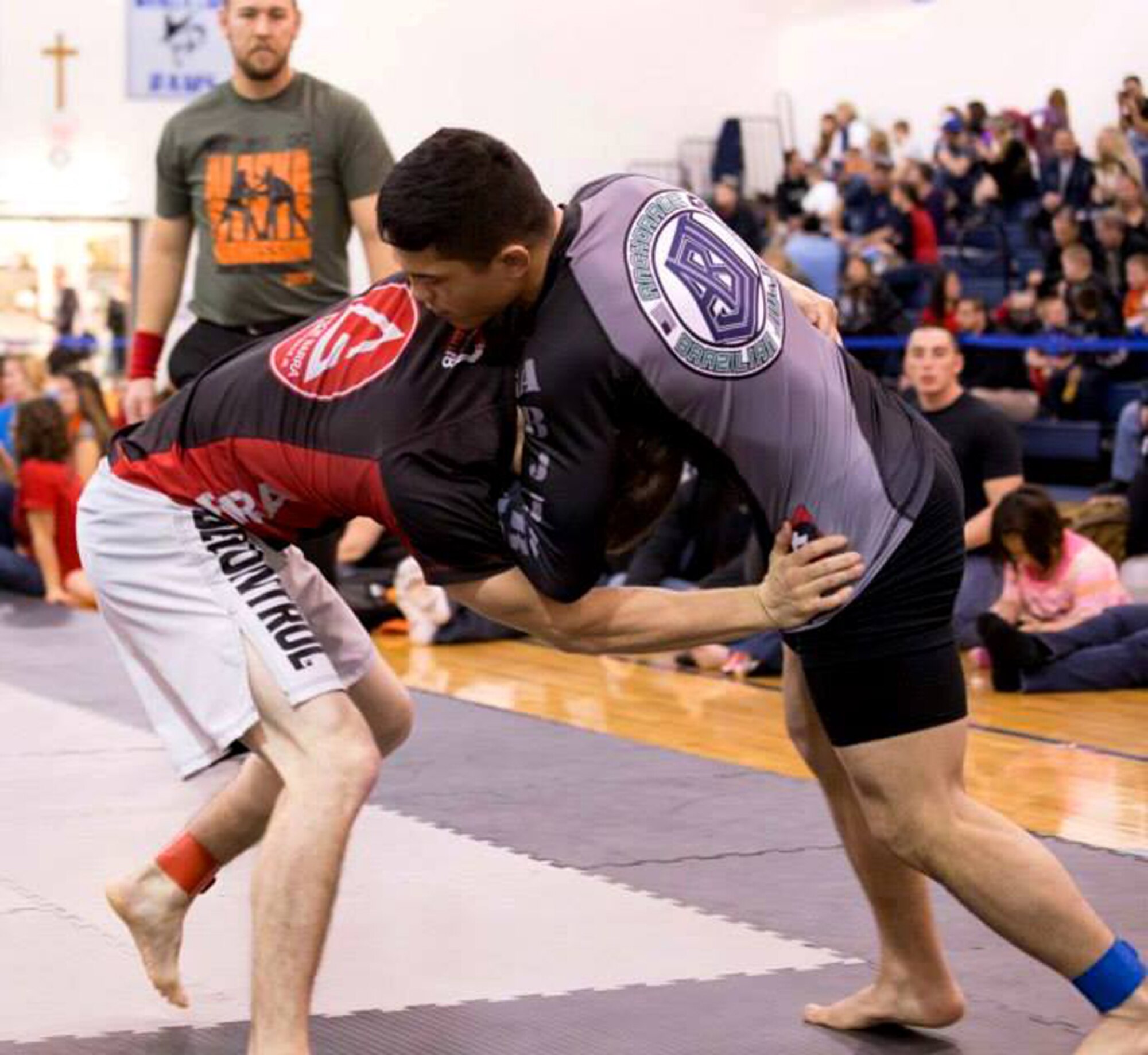 Pfc. Jason Hayden (right) grapples with an opponent during the Alaska State Jiu-Jitsu Championship tournament Nov. 2 hosted at the Lumen Christie High School in Anchorage. (Courtesy Photo)