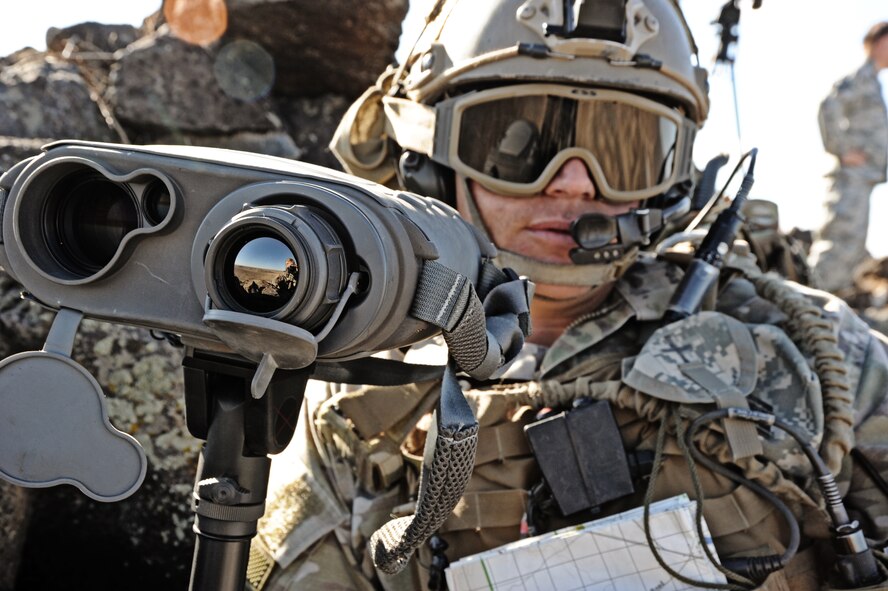 Airman 1st Class Jesse Van Patten, Tactical Air Control Party Specialist with the 124th Air Support Operations Squadron, trains as a liaison between the Air Force and the Army as command and control to the aircraft assets with the AH-64 Apache helicopters, shooting live gun and rocket fire on ground targets at the Orchard Combat Training Center near Boise, Idaho, on Nov. 1. (Air National Guard photo by Master Sergeant Becky Vanshur)