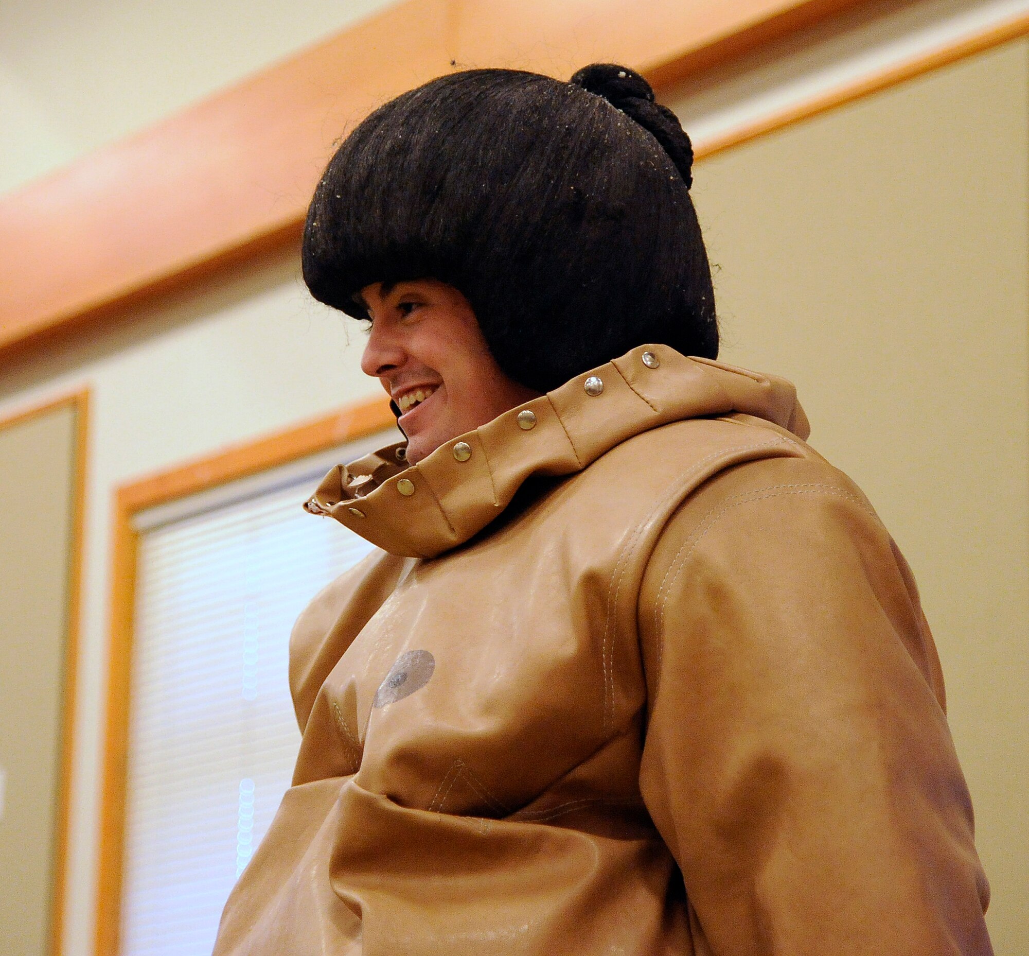 Senior Airman Joshua Busse, 341st Missile Security Forces Squadron member, dons his sumo suit to compete in a sumo wrestling competition during the Wing Sports Smackdown at the Grizzly Bend on Nov. 22. Of the several groups that competed for the WSS trophy, the 341st Mission Support Group took the win with 1,368 points.  (U.S. Air Force photo/Airman 1st Class Collin Schmidt)