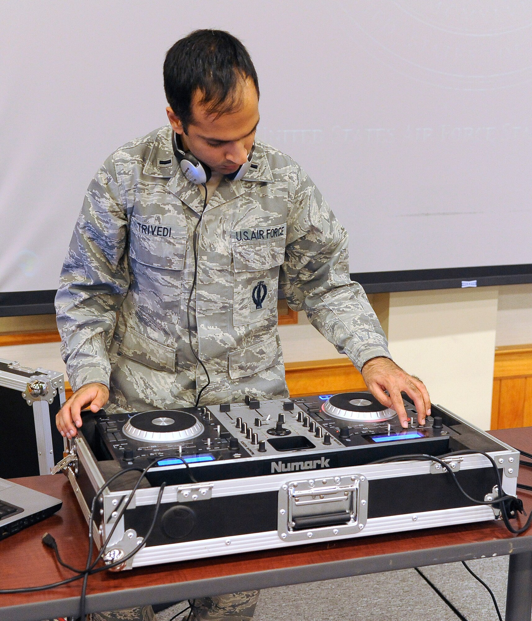 1st Lt. Pavan Trivedi, 341st Operations Support Squadron instructor deputy combat crew commander, provided musical entertainment for the Wing Sports Smackdown on Nov. 22. More than 340 Team Malmstrom members attended the event. (U.S. Air Force photo/Airman 1st Class Collin Schmidt) 