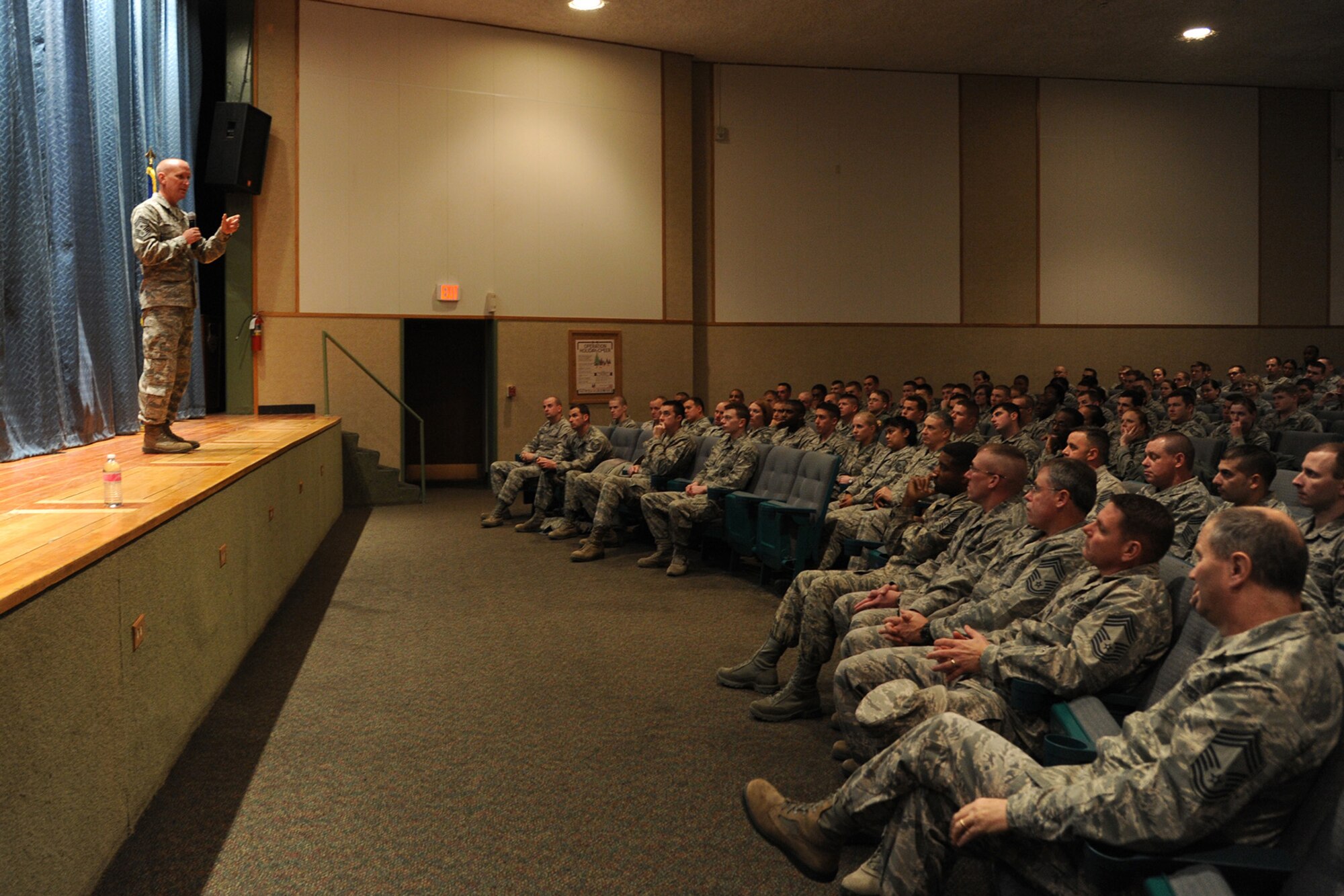 Chief Master Sgt. Brian Hornback, Air Force Global Strike Command chief, talks to members of Wing One during an enlisted all call held at the auditorium Nov. 21. During the all call, Hornback discussed various issues, including budget cuts and sequestration, the promotion system, enlisted performance reports and the future of the Air Force. (U.S. Air Force photo/Senior Airman Cortney Paxton)