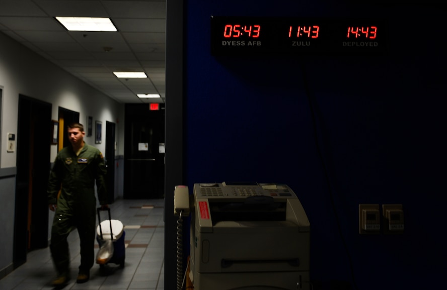 U.S. Air Force Senior Airman Matthew Bihlajama, 40th Airlift Squadron C-130J loadmaster, prepares for morning briefings Nov. 21, 2013, during Impact Day at Dyess Air Force Base, Texas. Impact Day was an opportunity for maintainers and aircrew personnel to shadow each other so that they could better understand the important roles each play in the Air Force. This training exercise was designed to enhance team building, appreciation and familiarity to ensure mission effectiveness. (U.S. Air Force photo by Staff Sgt. Vernon Young Jr./Released)