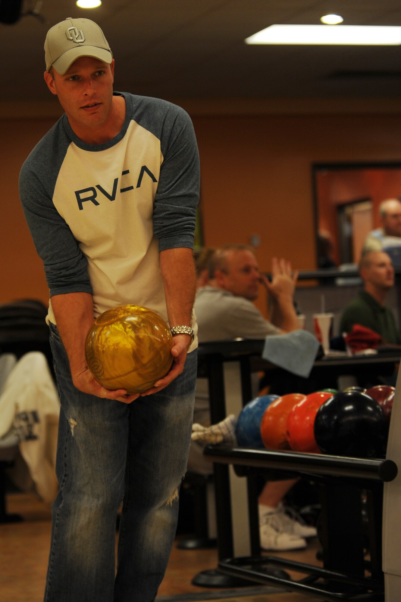 U.S. Air Force Tech. Sgt. Greg Styer, 633rd Communications Squadron acting first sergeant, lines up to bowl a frame at the Langley Lanes bowling center at Langley Air Force Base, Va., Nov. 20, 2013. In addition to having 24 lanes, both the Langley and Fort Eustis bowling centers offer a quick-service snack bar and year-round special events. (U.S. Air Force photo by Staff Sgt. Jarad A. Denton/Released)