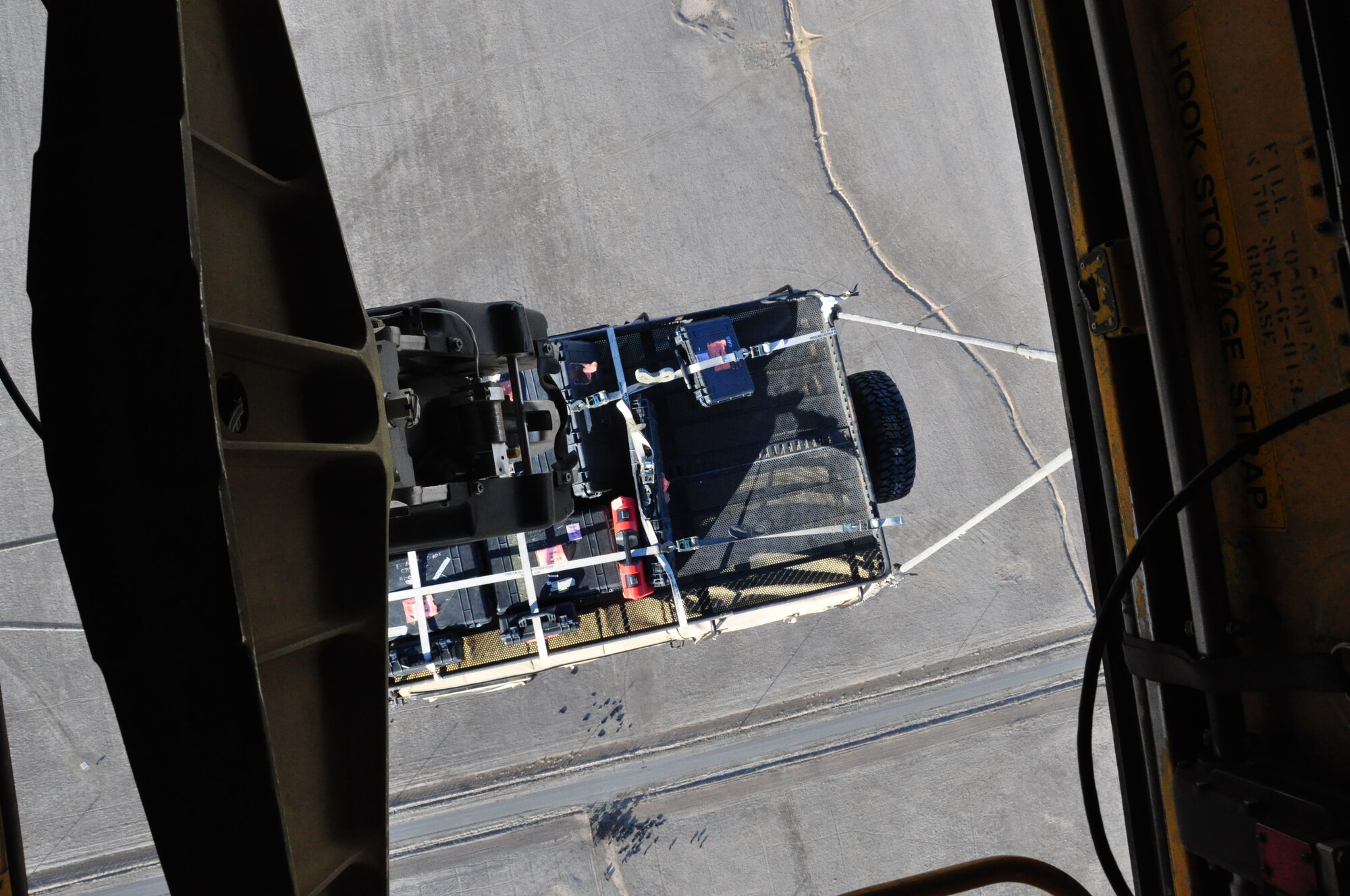 A Travis humvee is carried by an Army National Guard CH-47 Chinook Nov. 21 over Solano County. (U.S. Air Force photo/Staff Sgt. Patrick Harrower)