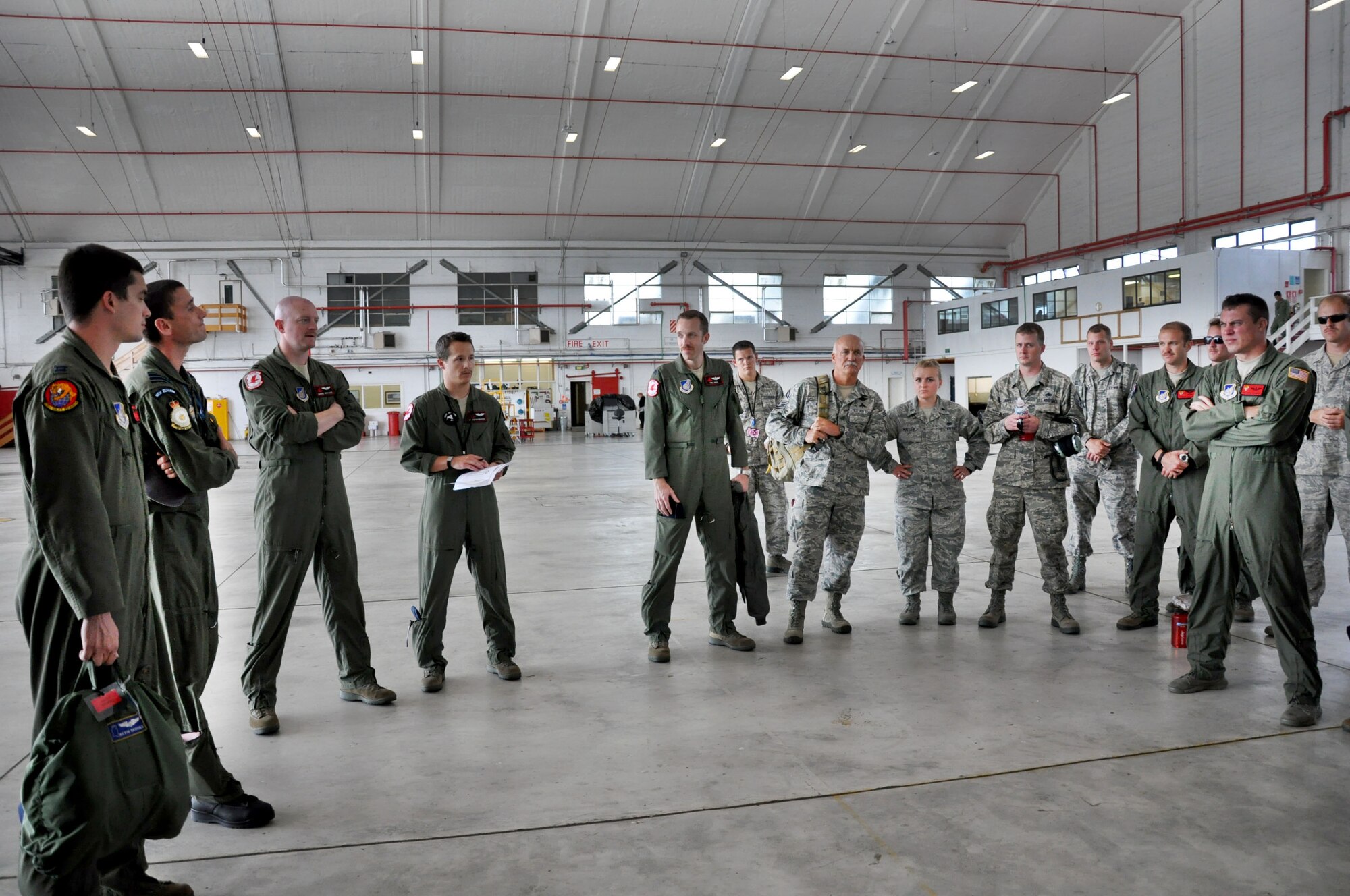 Royal New Zealand Air Force members bid farewell to the main body of United States Air Force Airmen departing RNZAF Base Ohakea, New Zealand, Nov. 25. More than 70 U.S. Airmen from Joint Base Elmendorf-Richardson, Alaska, and Joint Base Pearl Harbor-Hickam, Hawaii, deployed to the 517th Expeditionary Airlift Squadron to support Exercise Kiwi Flag. This group, from JBER, will board their home-station-bound C-17 Globemaster III after clearing customs. Kiwi Flag is a multilateral RNZAF-sponsored tactical airlift exercise conducted in New Zealand. The Royal Australian Air Force, Republic of Singapore Air Force and the French Armed Forces of New Caledonia also participated. Kiwi Flag personnel also provided cargo and passenger airlift including tactical air drops to Exercise Southern Katipo, New Zealand Defence Force’s largest-ever multilateral joint force amphibious exercise with eight other nations participating. (U.S. Air Force Photo by Senior Master Sgt. Denise Johnson/Released)