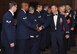 Col. David E. Graff, 325th Fighter Wing commander, congratulates Advanced Leadership School class 14-1 after their graduation ceremony Nov. 26 at the Horizons Community Center. (U.S. Air Force photo by 2nd Lt. Christopher Bowyer-Meeder) 