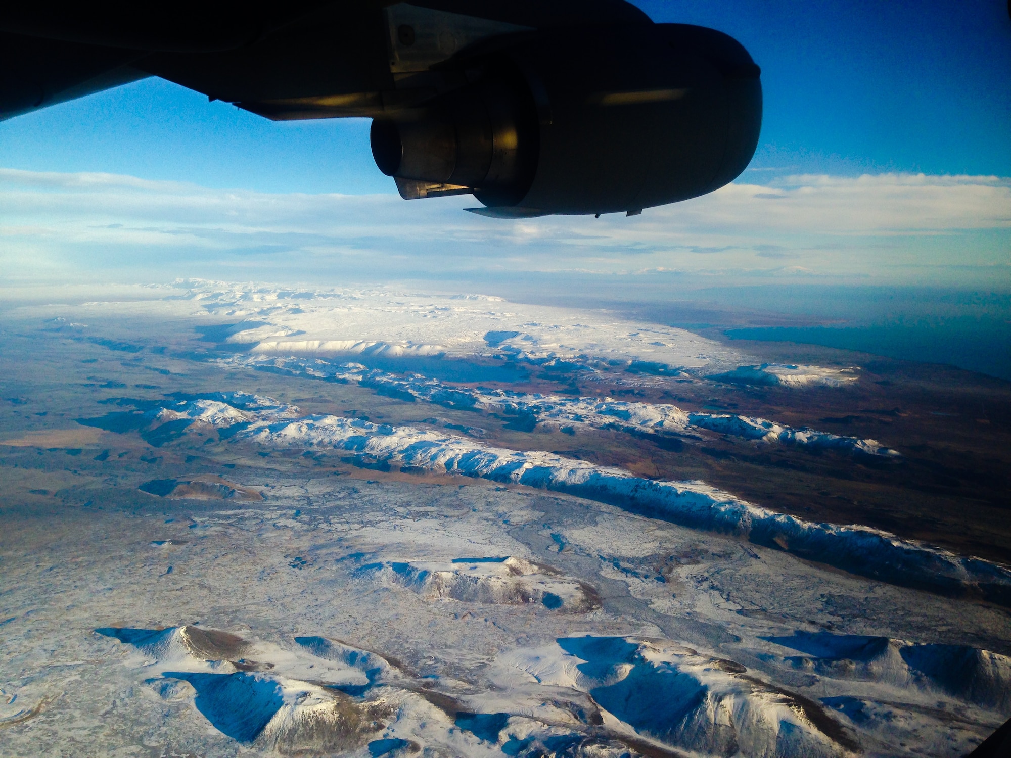 A Travis C-17 Globemaster III flies over Iceland Nov. 2 en route to Lakenheath Royal Air Field, England to pick up more F-15C Eagle ground support equipment in support of a NATO mission. (courtesy photo)