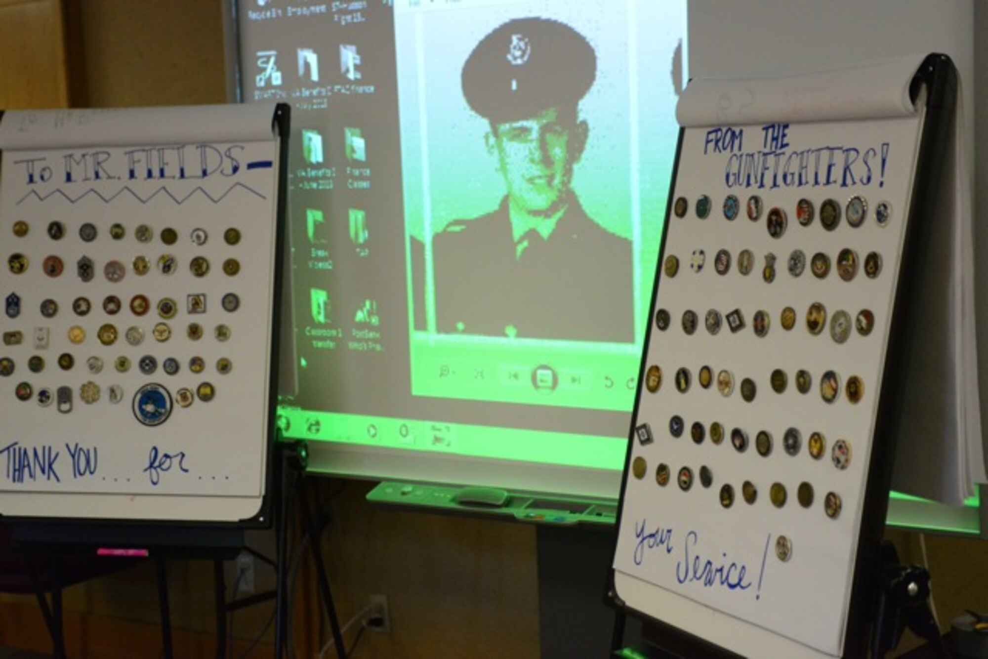 Coins are displayed at an event Nov 27, 2013, at Mountain Home Air Force Base, Idaho. The father of a 366th Security Forces Squadron Defender was recently the victim of a burglery while he was hospitalized and every coin he received throughout his career was stolen. (U.S. Air Force photo by Senior Airman Benjamin Sutton/Released) 