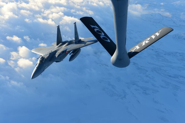 An F-15C Eagle breaks away after receiving fuel from a KC-135 Stratotanker while flying over Iceland Nov. 19, 2013. The 48th Air Expeditionary Group has been maintaining the North Atlantic Treaty Organization air surveillance and policing mission in Iceland since Oct. 28, 2013. (U.S. Air Force photo by Airman 1st Class Dana J. Butler/Released)
