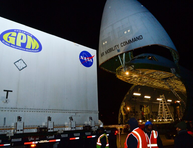 A Global Precipitation Measurement Satellite is carefully loaded into a C-5M Super Galaxy Nov. 20, 2013, at Joint Base Andrews, Md. Loadmasters from the 709th Airlift Squadron worked hand-in-hand with NASA engineers to ensure the delicate cargo was not damaged during the load. (U.S. Air Force photo/Tech. Sgt. Jeremy Larlee)