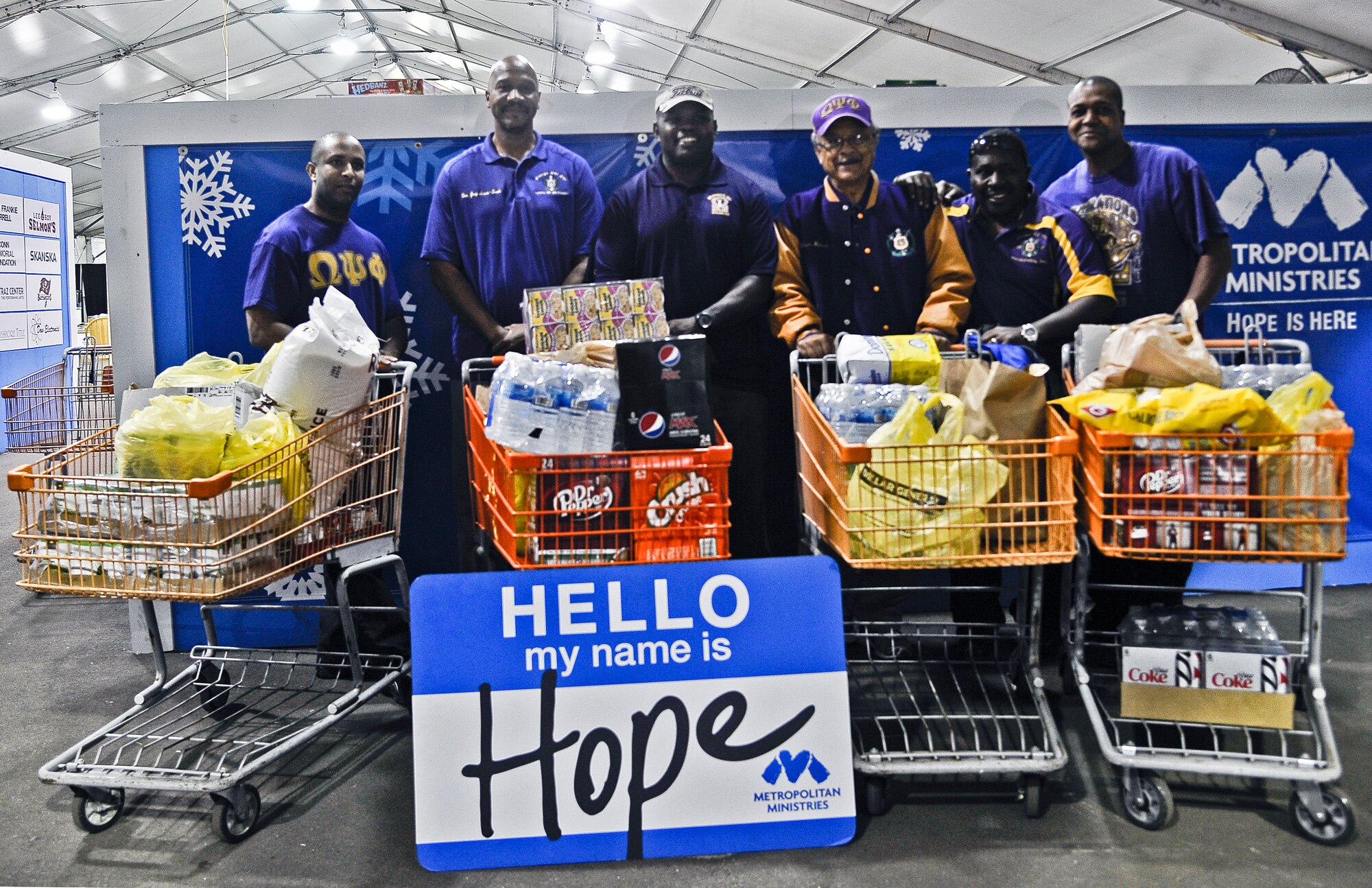 Members of Omega Psi Phi Fraternity Inc., Epsilon Mu Mu chapter, collected food for their annual Food Drive Nov. 25, 2013. The “MacDill Ques” donated over 700 pounds of food to Metropolitan Ministries, a non-profit organization specifically targeting homelessness and hunger in the Tampa Bay area. (U.S. Air Force photo by Airman 1st Class Vernon Fowler/Released)