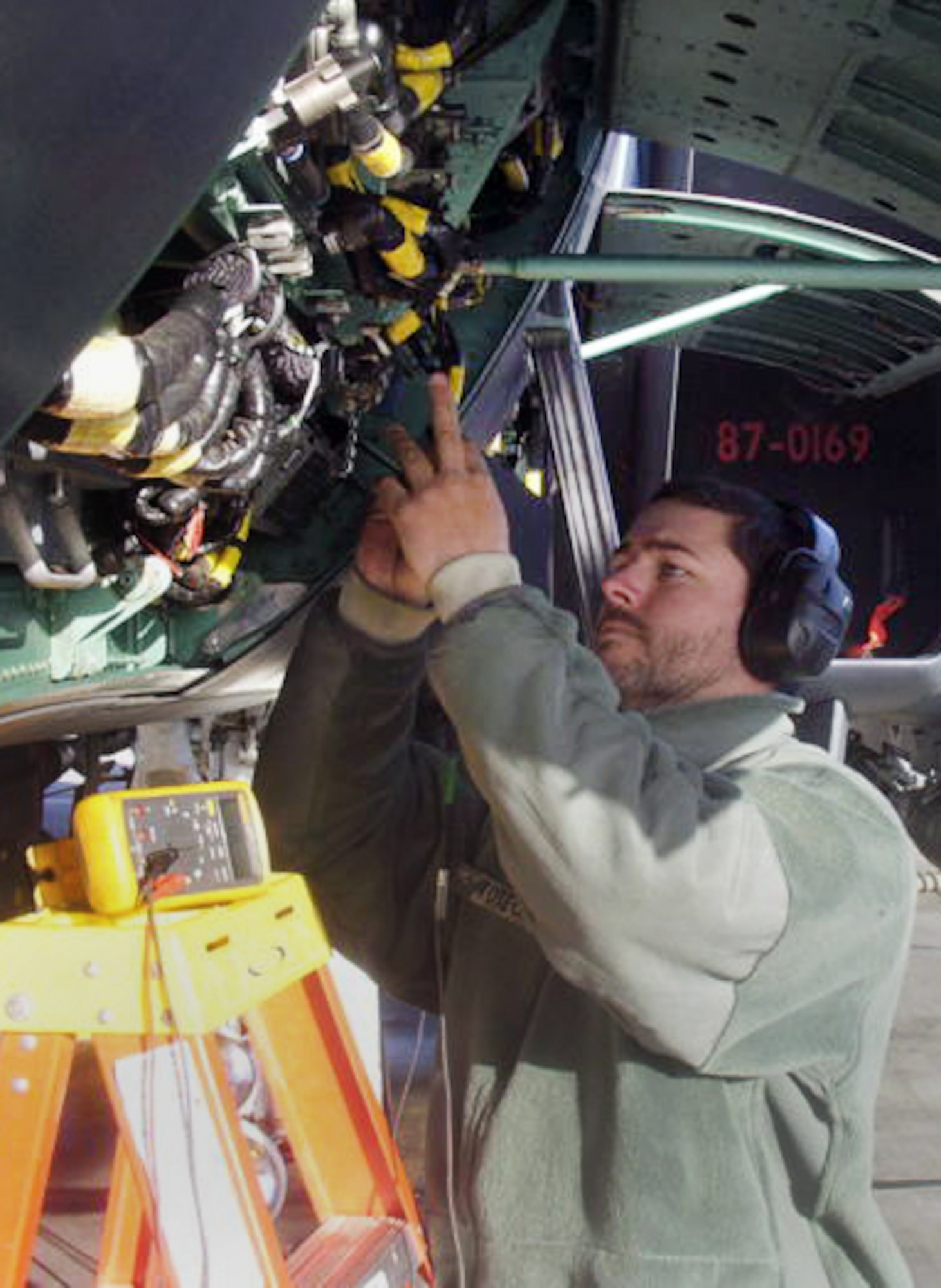 Justin Totton, Air Force Engineering and Technical Services avionics, works on an Environmental Control System malfunction April 22, 2011, on Bagram Air Base, Afghanistan. AFETS supports maintenance units in reaching self-sufficiency through training, assistance and knowledge continuity. (Courtesy photo)

