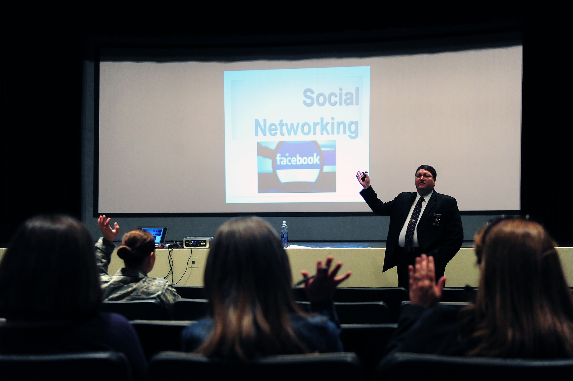 Police Lt. Thomas Flores, Wayne Country Sheriff’s Office financial crimes unit, talks to members of Team Seymour during a sexting and cyber bullying seminar at Seymour Johnson Air Force Base, N.C., Nov. 21, 2013.  Flores and Assistant District Attorney Terry Light spoke about the dangers of social media and other forms of electronic communication, especially those targeted toward children.  (U.S. Air Force photo by Airman 1st Class Brittain Crolley)