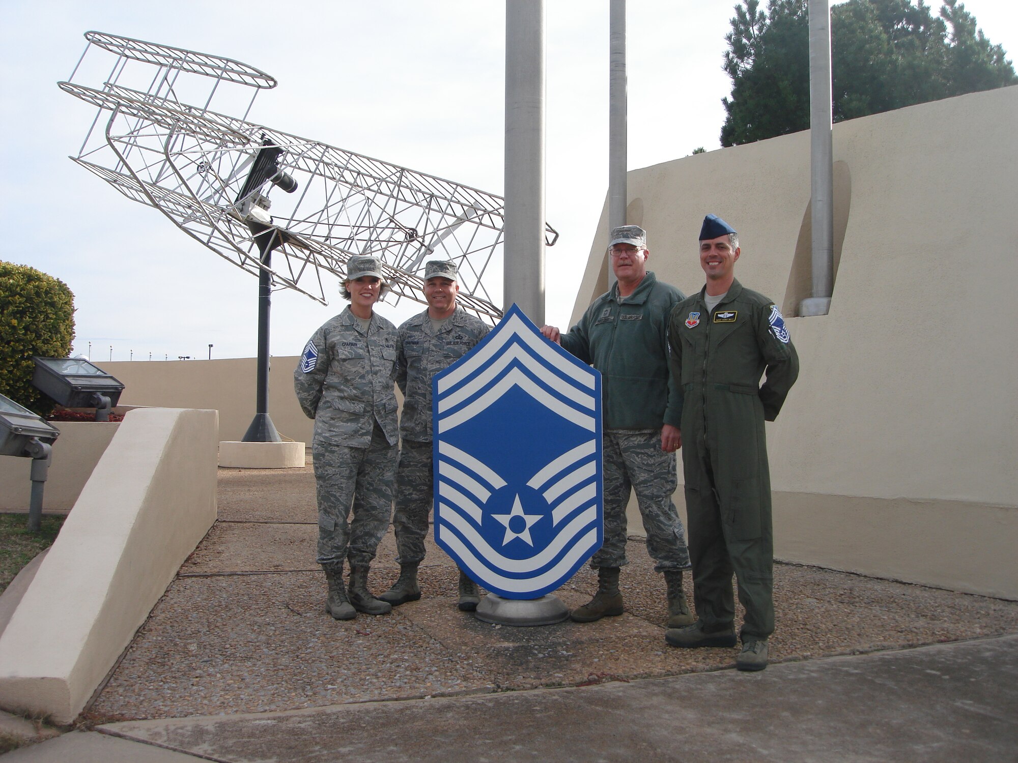 The Tinker Chiefs Group Organization recently recognized the newest chief master sergeant selects. Pictured with Tinker Chiefs Group President Chief Master Sgt. Jeffrey Spitzer, 960th Airborne Air Control Squadron, second from right, are, from left, Senior Master Sgt. Larae L. Chapman, 72nd Dental Squadron; Senior Master Sgt. Kraig W. Chapman, 72nd Operations Support Squadron; and Senior Master Sgt. Raymond K. Mott, 963rd Airborne Air Control Squadron. (Air Force photo by Chief Master Sgt. Patrick Palmer)