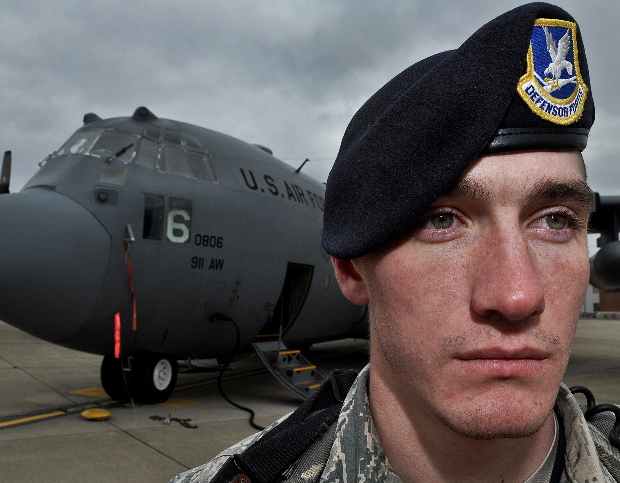Senior Airman Eric Sowinski, 911th Security Forces Squadron patrolman, guards a C-130 Hercules while performing aircraft security training during a routine exercise, Nov. 19, 2013 at the Pittsburgh International Airport Air Reserve Station. (U.S. Air Force photo by Senior Airman Joshua J. Seybert)