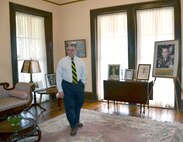 John Manguso, former Fort Sam Houston Museum director, shows off the Haines-Swift room, which is the upstairs right-front bedroom. The room is named for Gen. Ralph E. Haines Jr. as well as Gens. Eben Swift and Innis P. Swift.