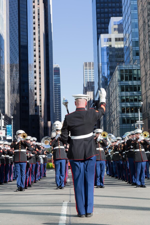 Staff Sgt. Mark Bender led the East Coast Marine Corps Combined Band 2.5 miles through the streets of New York in the Macy's Thanksgiving Day Parade on Nov. 28, 2013. Comprised of 80 instrumentalists from the Marine Corps’ three largest east coast installations; Marine Corps Base Quantico, Va., Camp Lejeune, N.C., and Marine Corps Air Station Cherry Point, N. C., the Marines participated for only the second time in the parades 89 year history. 