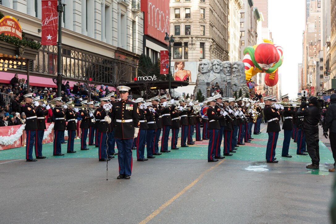 The East Coast Marine Corps Combined Band marches 2.5 miles through the streets of New York in the Macy's Thanksgiving Day Parade on Nov. 28, 2013. Comprised of 80 instrumentalists from the Marine Corps’ three largest east coast installations; Marine Corps Base Quantico, Va., Camp Lejeune, N.C., and Marine Corps Air Station Cherry Point, N. C., the Marines participated for only the second time in the parades 89 year history. 