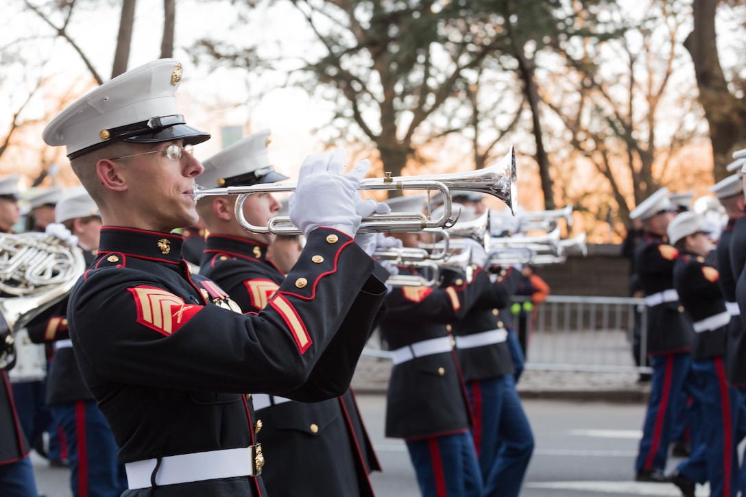 The Trumpet Section, East Coast Marine Corps Combined Band marches the 2.5 miles trek through the streets of New York in the Macy's Thanksgiving Day Parade on Nov. 28, 2013. Comprised of 80 instrumentalists from the Marine Corps’ three largest east coast installations; Marine Corps Base Quantico, Va., Camp Lejeune, N.C., and Marine Corps Air Station Cherry Point, N. C., the Marines participated for only the second time in the parades 89 year history. 