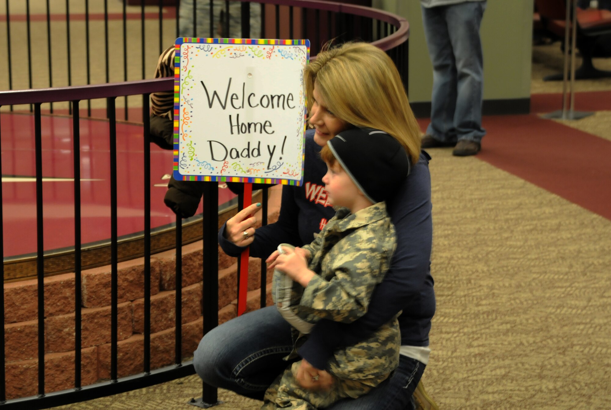 Thirteen Airmen with the 188th Security Forces Squadron returned Nov. 27, 2013, from a six-month deployment to the Middle East just in time to spend Thanksgiving with their families. The Airmen, who left last May, arrived at Fort Smith Regional Airport and were promptly treated to a to hero’s welcome home. Along with a host of family, friends and wing leadership, Maj. Gen. William Wofford, Arkansas National Guard adjutant general, and Brig. Gen. Dwight Balch, Arkansas Air National Guard commander, were on hand to welcome back the returning Airmen. (U.S. Air National Guard photo by Maj. Heath Allen/188th Fighter Wing)