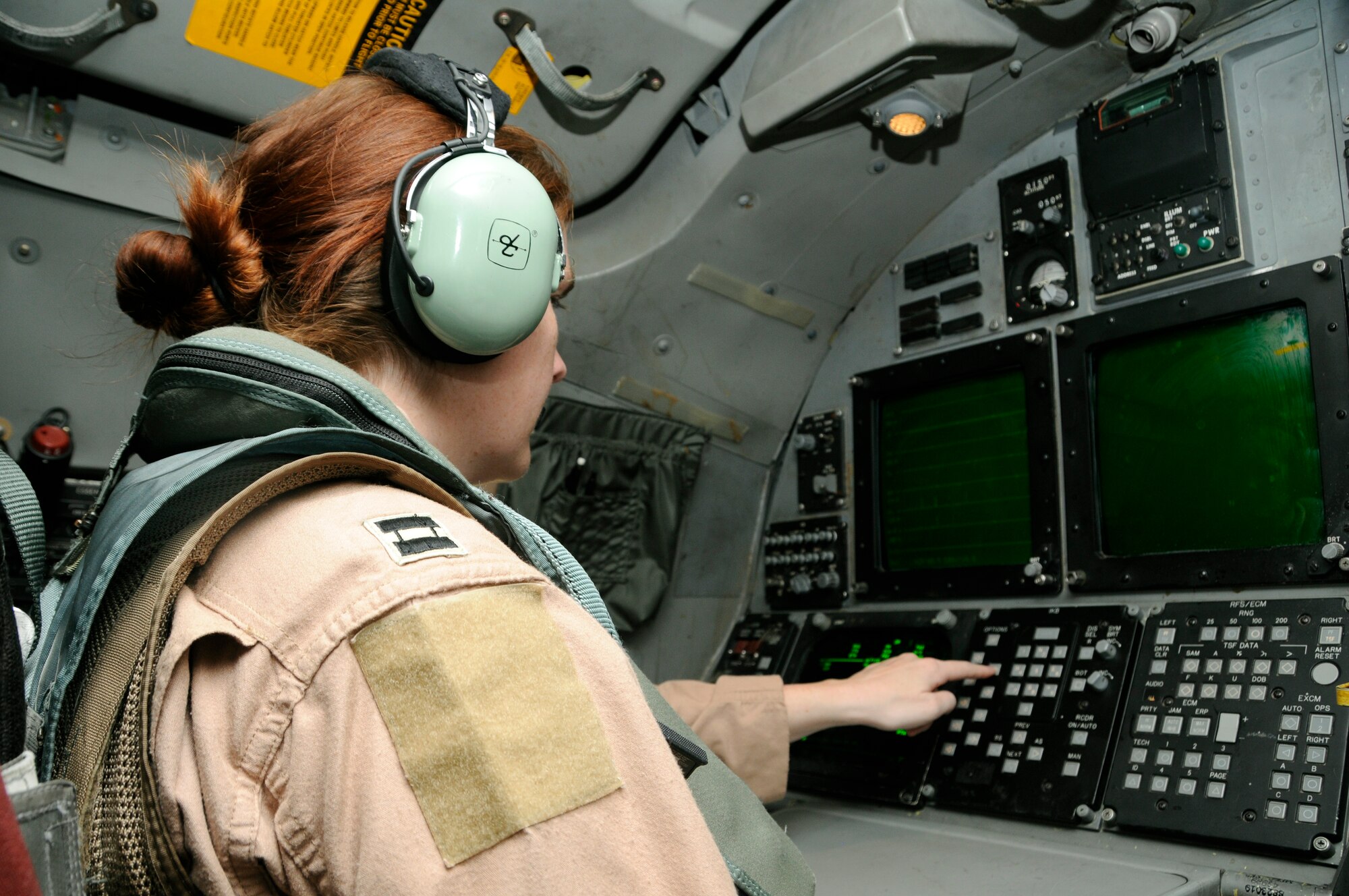 Capt. Laura Hunstock prepares for takeoff in support of Operation Enduring Freedom at the 379th Air Expeditionary Wing in Southwest Asia, Nov. 19, 2013. Hunstock is a 9th Expeditionary Bomb Squadron weapons system officer deployed from Dyess Air Force Base, Texas, and originally from Bossier City, La. (U.S. Air Force photo/Senior Airman Hannah Landeros)