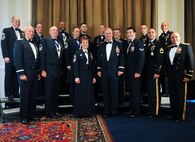 The National Guard's 2012 Outstanding Soldiers and Airmen of the Year are pictured with the chief of the National Guard Bureau, the directors of the Army and the Air National Guard, the senior enlisted leader of the National Guard Bureau and the senior enlisted leaders of the Army and the Air National Guard at a banquet in their honor in Arlington, Va., on Aug. 24, 2012.