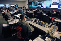 Personnel in the National Guard Command Center in Arlington, Va., monitor the progress of Tropical Storm Isaac as it makes its way through the Gulf of Mexico, Tuesday, Aug. 28, 2012. The NGCC, which serves as a hub that provides an overall tracking and coordination of National Guard elements, has gone to 24 hour operations in preparation for Isaac making landfall. Isaac's predicted path has it hitting the Gulf Coast region sometime Tuesday or Wednesday.