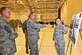 Staff Sgt. Amanda Davidson briefs Air Force Chief of Staff Gen. Mark A. Welsh III and Chief Master Sgt. of the Air Force James A. Cody, Nov. 26, 2013, on Grand Forks Air Force Base, N.D. Davidson is a  319th Operations Support Squadron weather forecaster. (U.S. Air Force photo/Senior Airman Xavier Navarro)