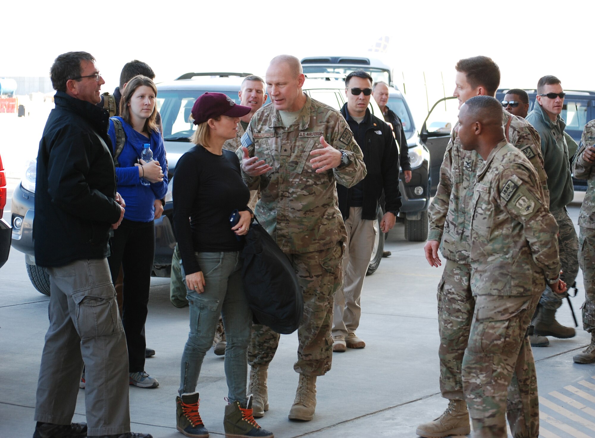 Brig. Gen. Patrick Malackowski talks to Deputy Secretary of Defense Ashton Carter and his wife Stephanie before a meeting with a group of soldiers and Airmen at Bagram Airfield, Afghanistan, November 28, 2013. Secretary Carter visited with wing leadership, met with patients at the Craig Joint Theater Hospital, served Thanksgiving meals to service members and ate dinner with Airmen. (U.S. Air Force photo by Capt. Brian Wagner)