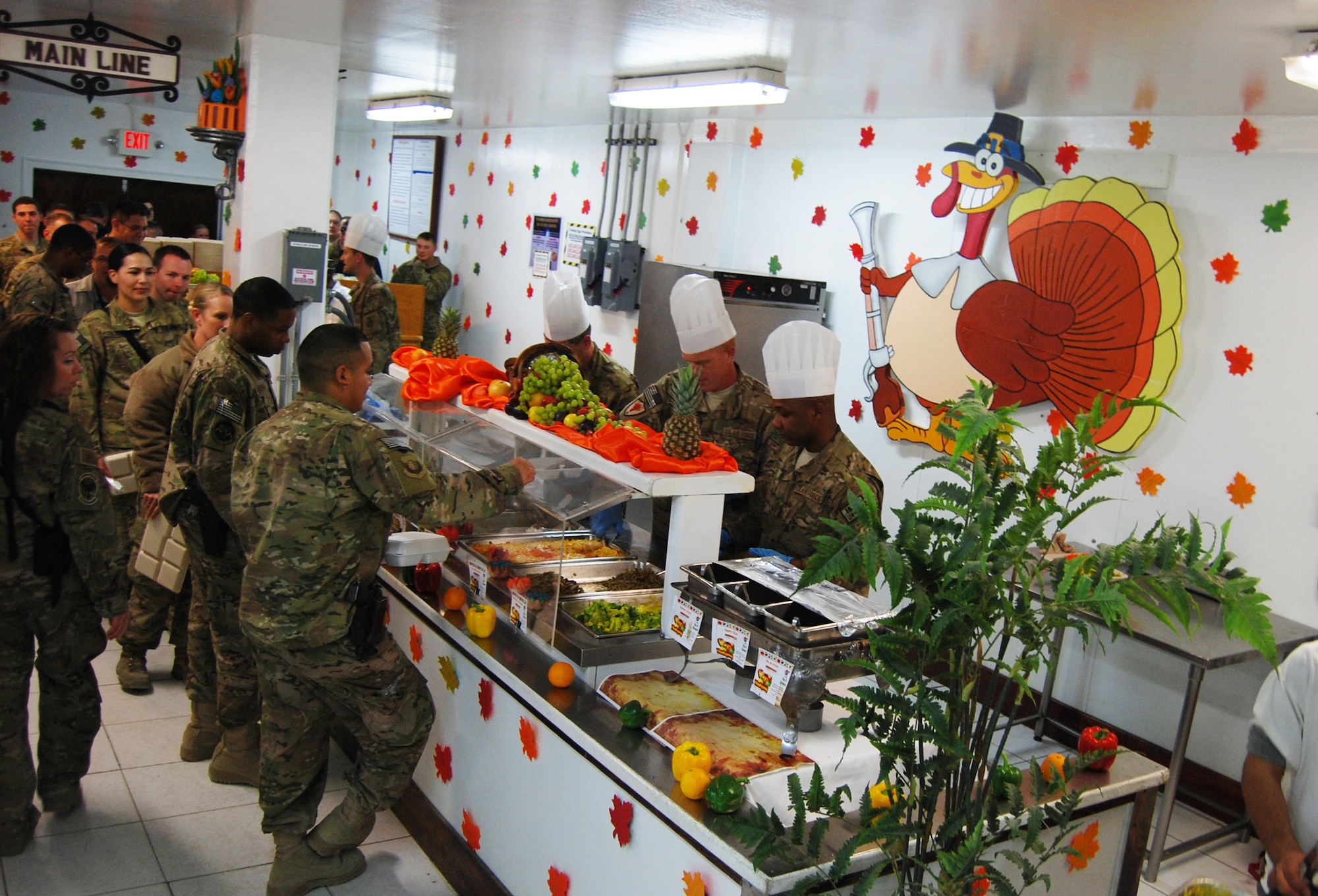 Senior Air Force leaders stepped in to serve Thanksgiving dinner at the Dragon DFAC at Bagram Airfield, Afghanistan, November 28, 2013. Various senior leaders took shifts serving dinner to service members, civilians and contractors at Bagram Airfield, Afghanistan. (U.S. Air Force Photo by Capt. Brian Wagner)