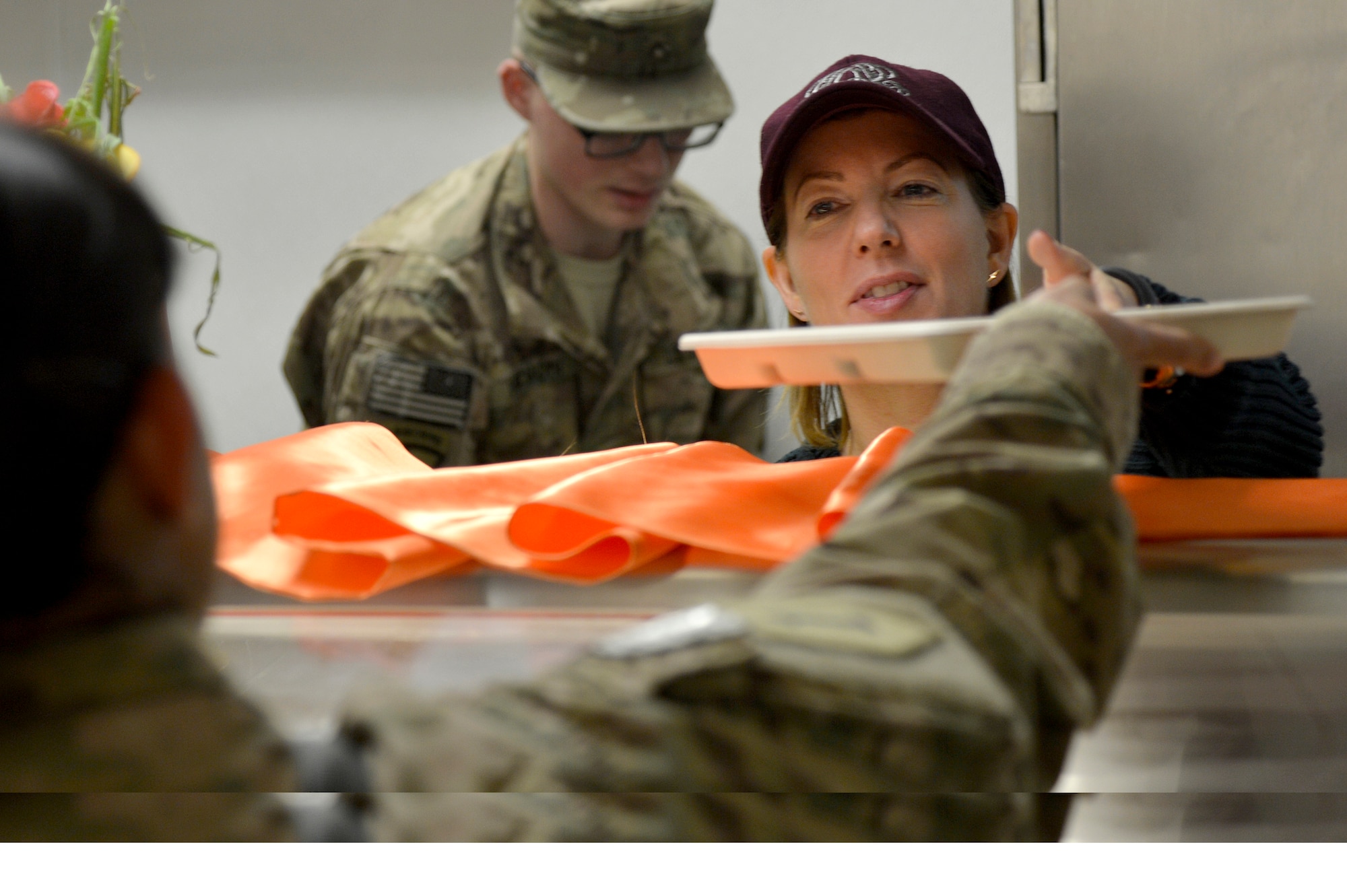 Mrs. Stephanie Carter, wife of U.S. Deputy Secretary of Defense, serves Thanksgiving dinner for Service members at Bagram Airfield, Afghanistan, Nov. 28, 2013. Carter served Service members dinner before joining them for dinner herself. (U.S. Air Force photo by Senior Airman Kayla Newman)
