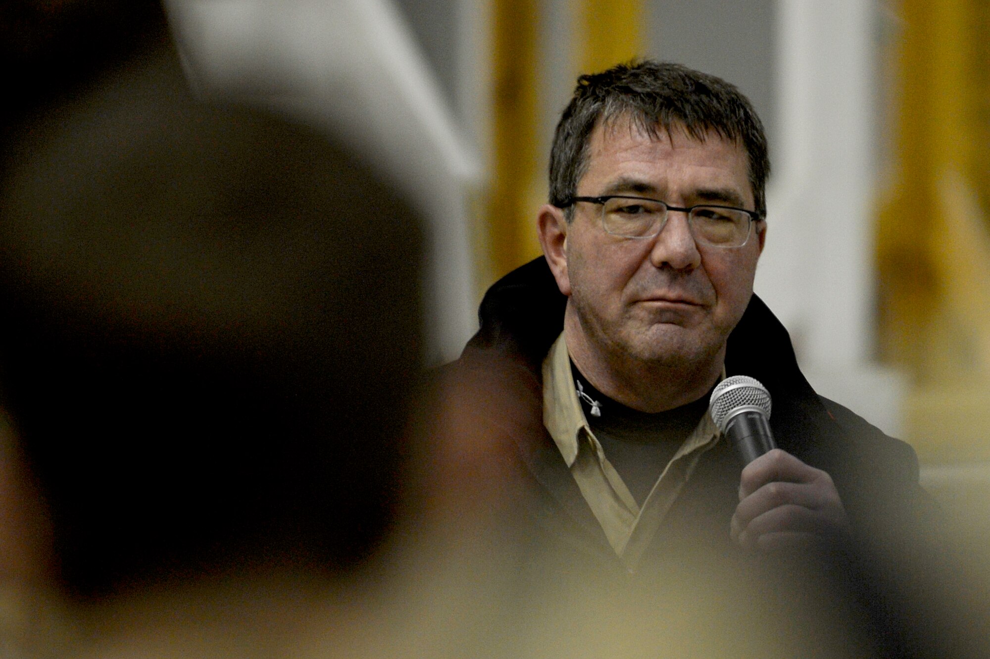 Mr. Ashton Carter, U.S. Deputy Secretary of Defense, speaks with Service members at Bagram Airfield, Afghanistan, Nov. 28, 2013. Following his speaking engagement, Carter served dinner to Bagram personnel at Khoele Dining Facility. (U.S. Air Force photo by Senior Airman Kayla Newman)