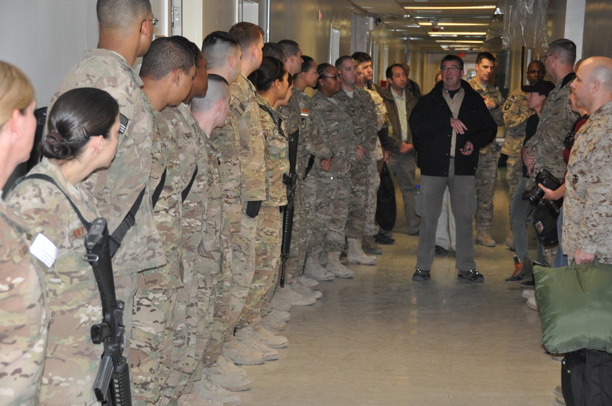 Mr. Ashton Carter, U.S. Deputy Secretary of Defense, and his wife Mrs. Stephanie Carter, speak to hospital staff members from the Heathe N. Craig Joint Theater Hospital during a Thanksgiving day visit at Bagram Airfield, Afghanistan, Nov. 28, 2013. (U.S. Air Force Photo/Tech. Sgt. Rob Hazelett)