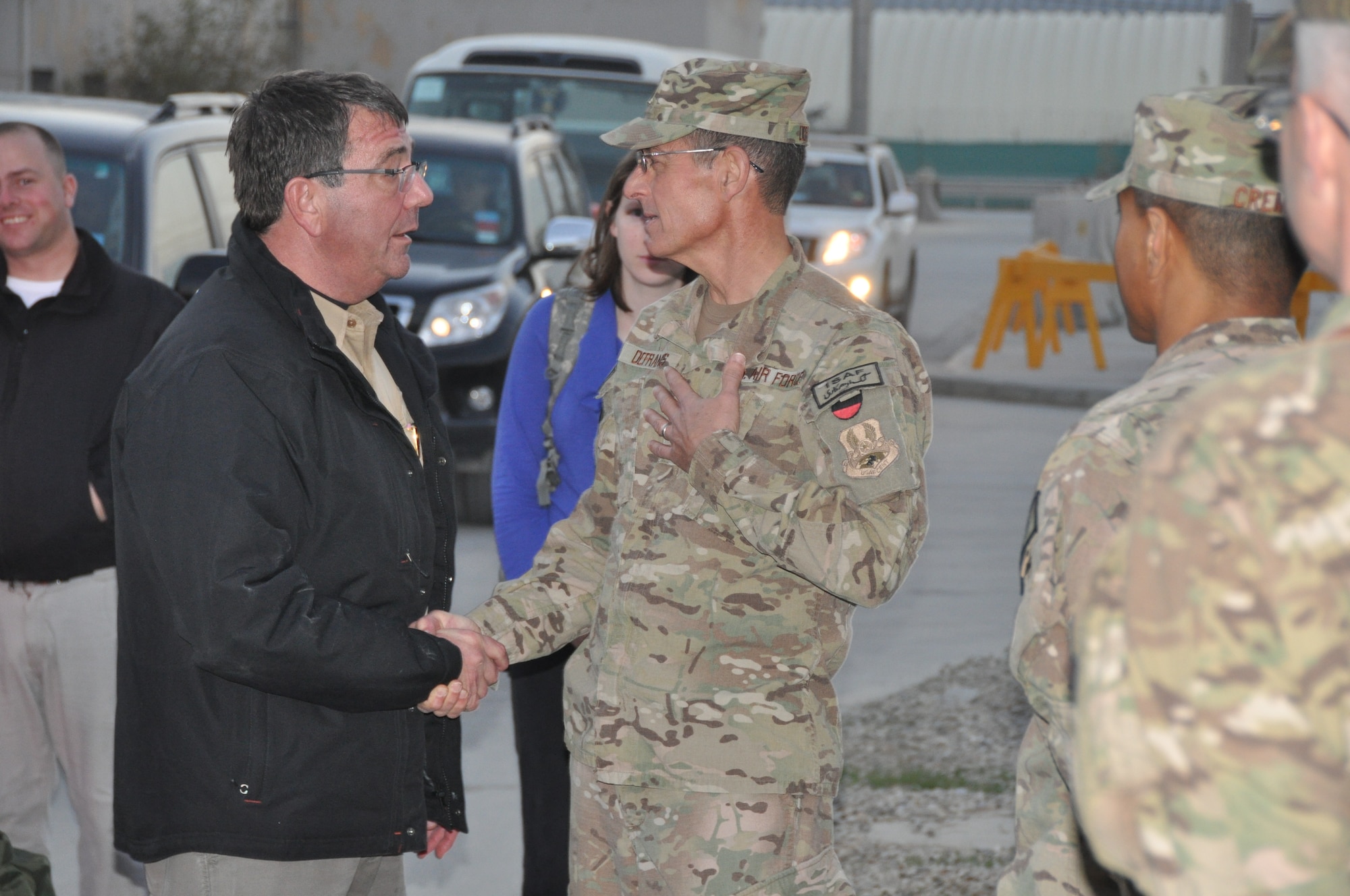 Mr. Ashton Carter, U.S. Deputy Secretary of Defense, greets Col. Dominic DeFrancis, 455th Expeditionary Medical Group commander, at the Heathe N. Craig Joint Theater Hospital during a Thanksgiving day visit at Bagram Airfield, Afghanistan, Nov. 28, 2013. (U.S. Air Force Photo/Tech. Sgt. Rob Hazelett)