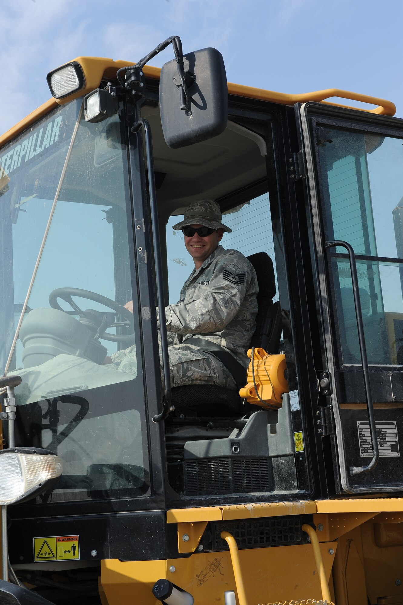 Tech. Sgt. Mark Ondersma is a pavement and equipment operator at the 386th Expeditionary Civil Engineer Squadron, undisclosed location, Southwest Asia.  He is responsible for maintaining the roads, grounds and airfields of the 386th Air Expeditionary Wing.  Ondersma, a native of Byron Center, Mich., is on his third deployment.  He is deployed from the 110th Civil Engineer Squadron, Michigan Air National Guard, Battle Creek, Mich.  (U.S. Air Force photo by Master Sgt. Marelise Wood)
