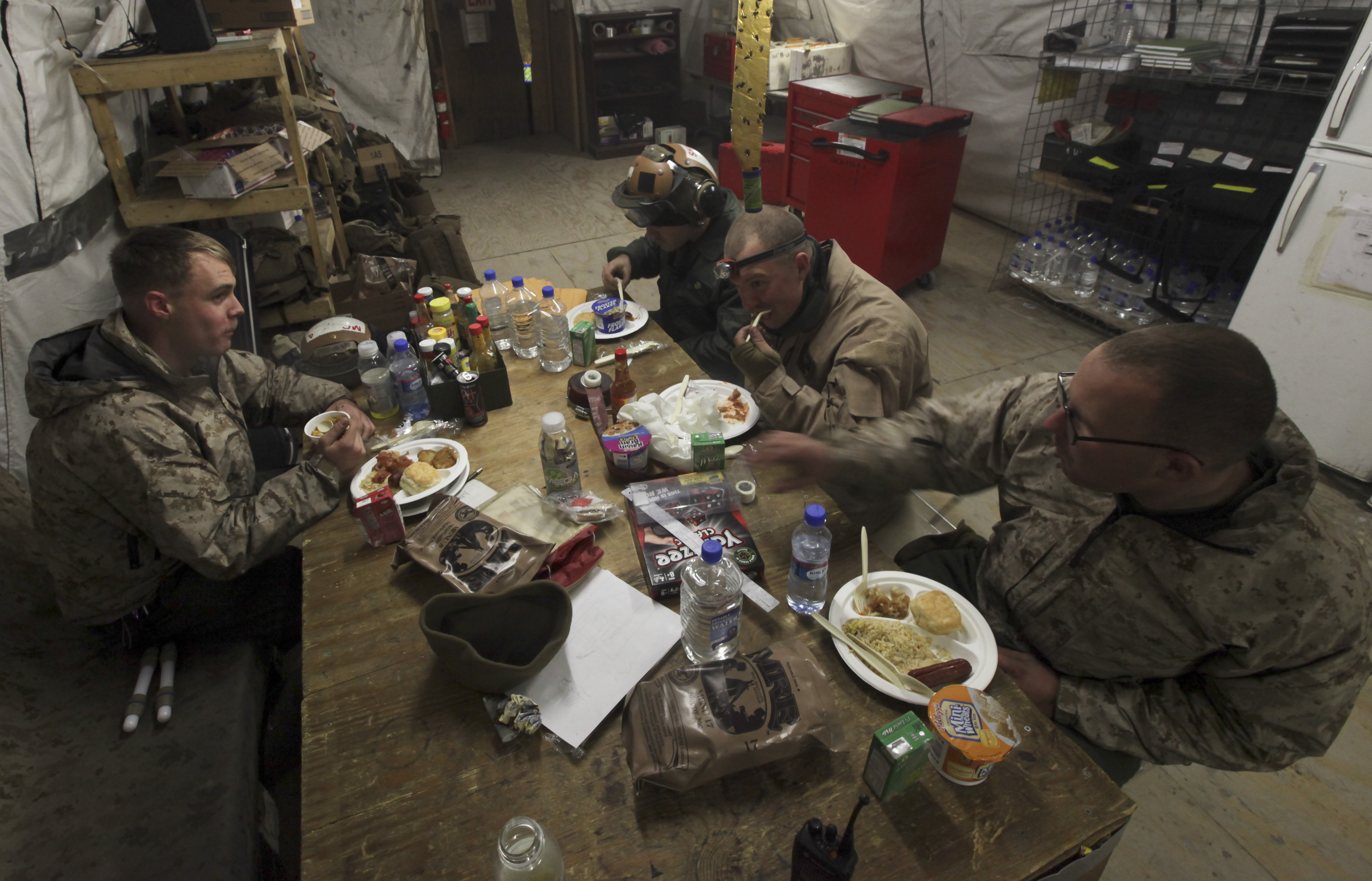U S Marines Enjoy An Early Morning Thanksgiving Breakfast Together During A Break In Their Shift Work On Camp Leatherneck Afghanistan Nov 28 2013 The Marines Are Assigned To Marine Light Attack Helicopter Squadron 369