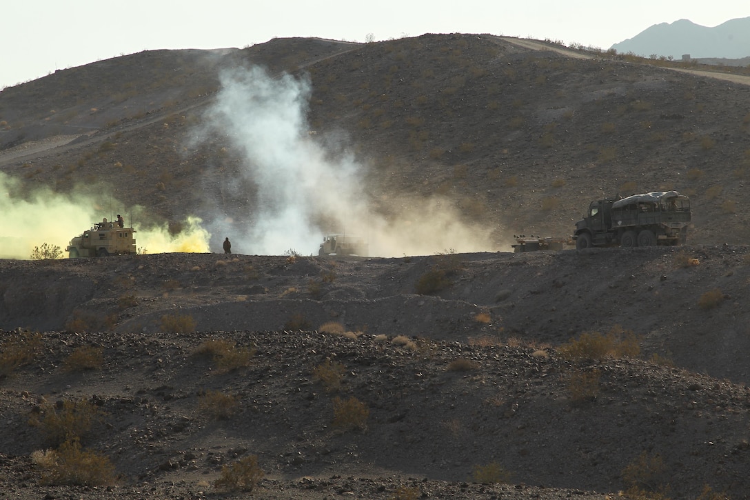 A Simulated Improvised Explosive Device gets triggered during the first phase of the vehicle convoy for a Combat Logistics Patrol in the Combat Center’s Lava Lake training area Nov. 15, 2013.


