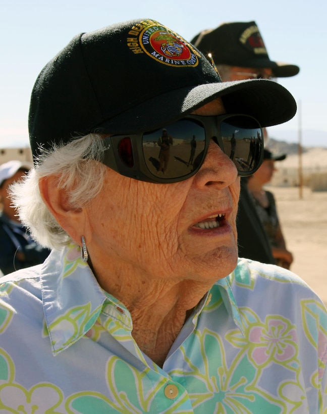 Katy Daley of Victorville, who served in the Marine Corps during World War II, surveys the landscape at Ranges 200/215 with fellow High Desert Marines members during a tour of the Combat Center on Nov. 20, 2013.