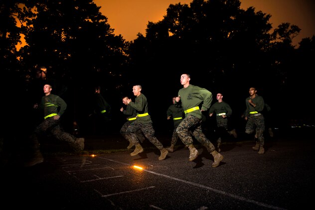 Infatry Training Battalion students with Delta Co. run the movement to contact portion of the Combat Fitness Test during their first week of training at Camp Geiger, N.C, Sept. 26, 2013. The students must pass the ITB standard for the physical fitness test and CFT to continue on in the course. The students are part of the first ITB company to include female Marines as part of ongoing research into opening combat-related job fields to women. (U.S. Marine Corps photo by Sgt. Tyler L. Main/Released)