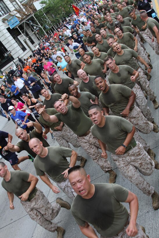 Marines from Recruiting Station New York  run in a formation lead by the RS Commanding Officer, Maj. Robert M. Jones, Jr., during the Tunnel to Towers run in Manhattan Sept. 29.  Tunnel to Towers, a 5-kilometer run, is held annually in honor of firefighter Stephen Siller.  Siller, who ran to the World Trade Center through the Battery Tunnel with all his gear on during the attacks on 9/11, ultimately lost his life during his attempt to save others.  (U.S. Marine Corps photo by Sgt. Kristin Moreno).