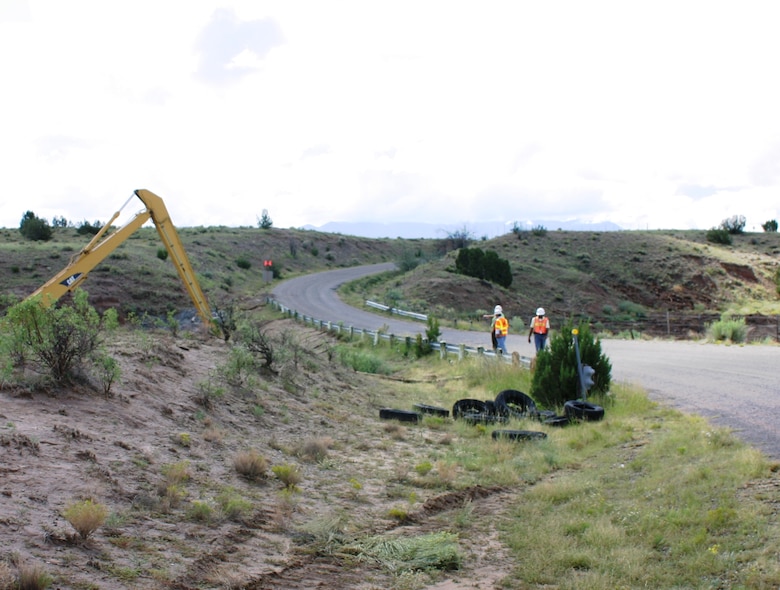 GALISTEO DAM, N.M., -- The dam's only access road was in danger from several feet of undercutting until it was fixed with the assistance of the Bureau of Reclamation.