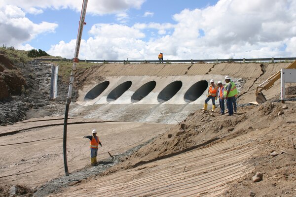 GALISTEO DAM, N.M., -- Construction on the dam's access road. Water was undercutting the culvert and threatening the road until it was corrected with help from the Bureau of Reclamation.