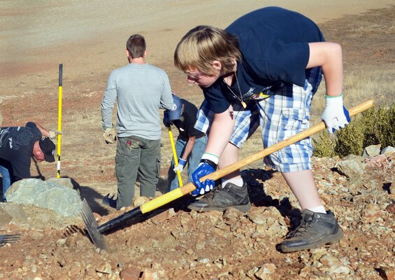 Boy Scouts with Troop 352 of Valley Springs, Calif., help build a trail during National Public Lands Day, Sept. 28, 2013, at New Hogan Lake, the U.S. Army Corps of Engineers Sacramento District park near Valley Springs. (U.S. Army photo by Robert Kidd/Released)