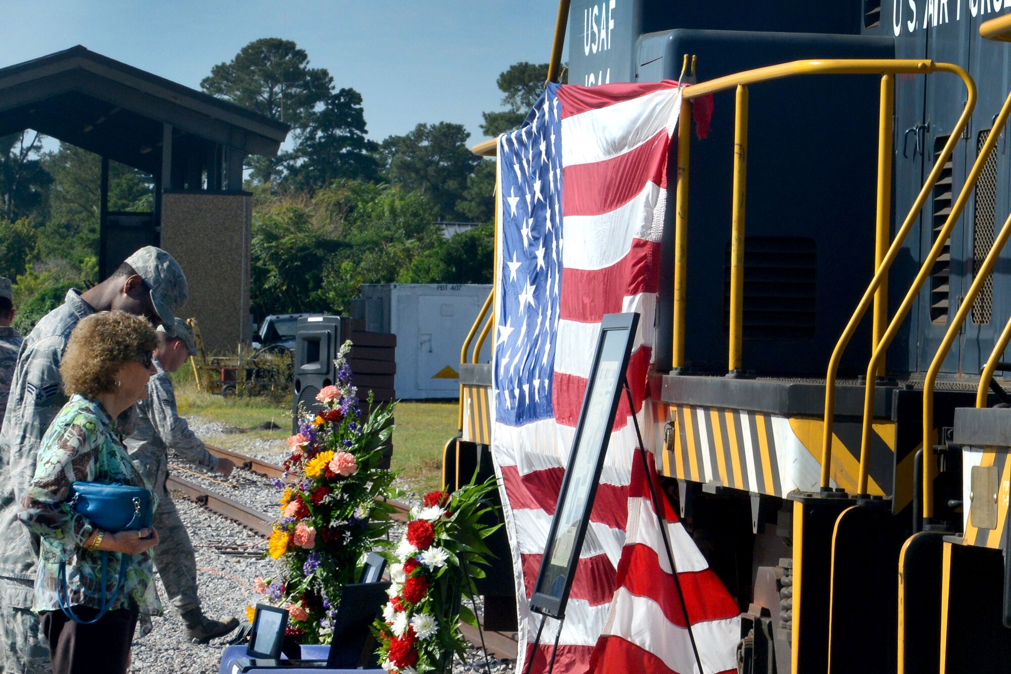 Military members, family and friends join together for the remembrance of Michelle Hill, 20th Logistics Readiness Squadron D-Flight conductor, Shaw Air Force Base, S.C., Sept. 30, 2013. Hill was a locomotive conductor for 16 years. (U.S. Air Force photo by Airman 1st Class Ashley L. Gardner/Released)

