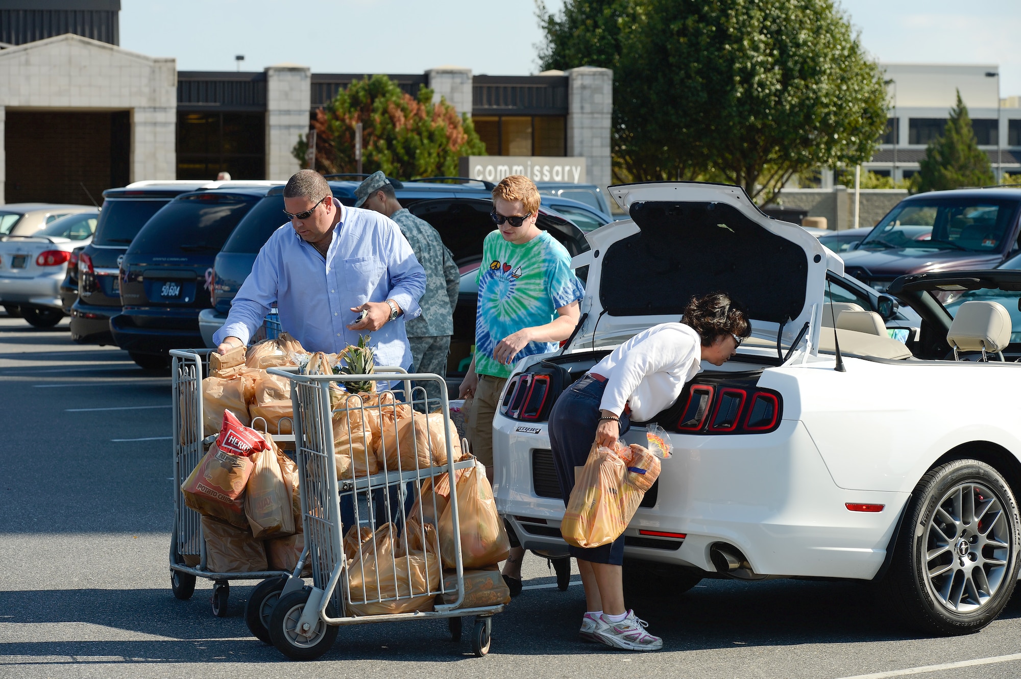 After the announcement of the pending closure of the Dover Air Force Base, Del. commissary due to the government shutdown, there was a rush from patrons trying to stock up while they could. The Defense Commissary Agency, or DeCA, runs military commissaries around the world and Dover's will close Oct. 2, 2013. (U.S. Air Force photo/Greg L. Davis)
