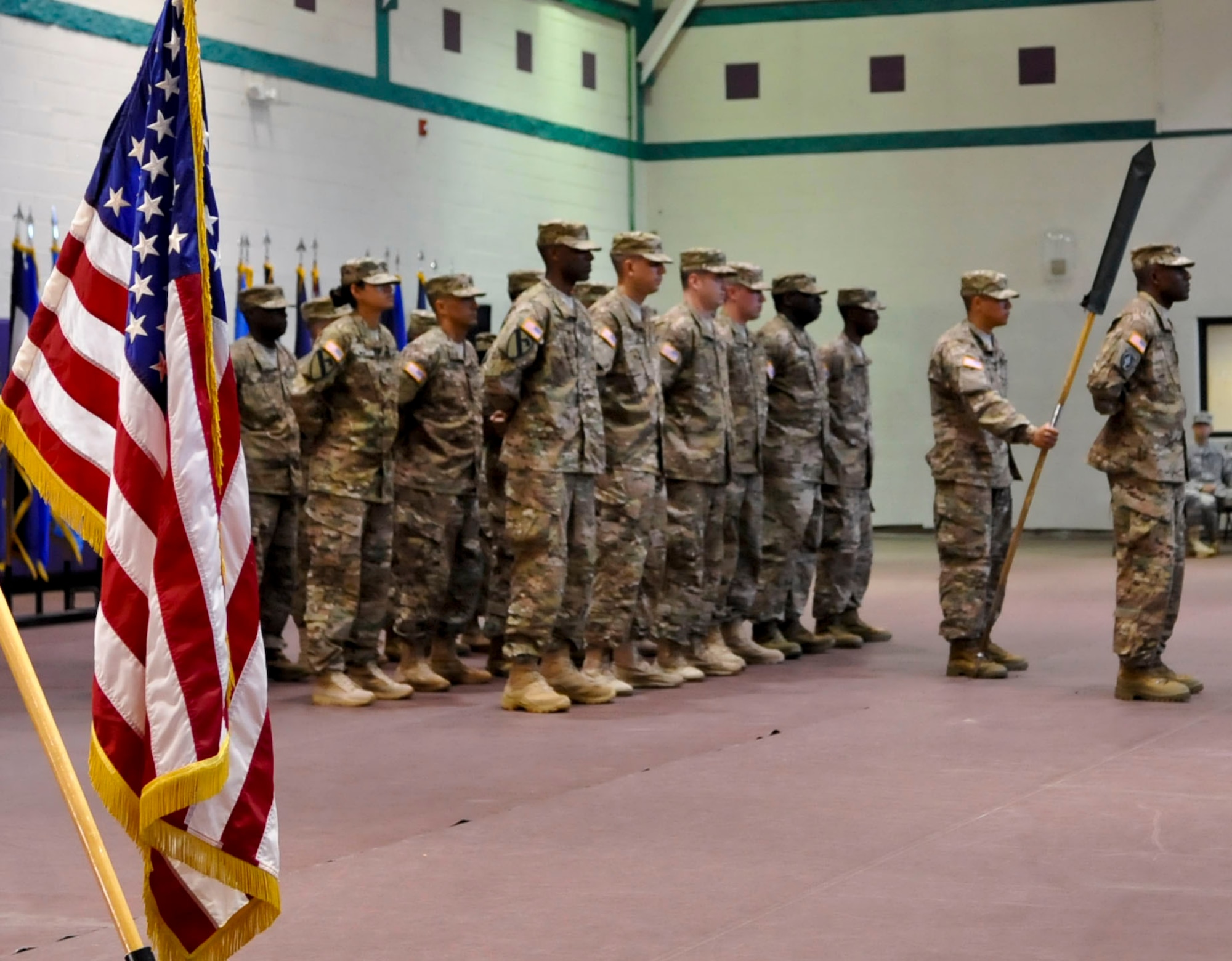 Members of the 271st Movement Control Team stand in formation during a deployment ceremony at Fort Eustis, Va., Sept. 30, 2013. The MCT will deploy to Bagram Air Base, Afghanistan in support of Operation Enduring Freedom. (U.S. Air Force photo by Staff Sgt. Wesley Farnsworth/Released)